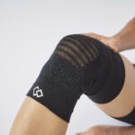Man wearing Colantotte Knee Support